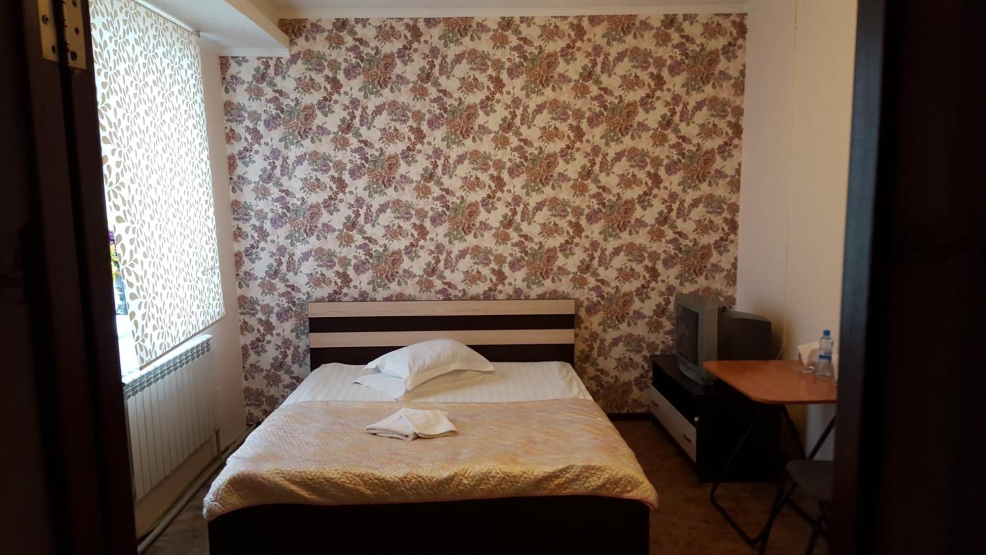 Astina Hotel Astana Quarto foto